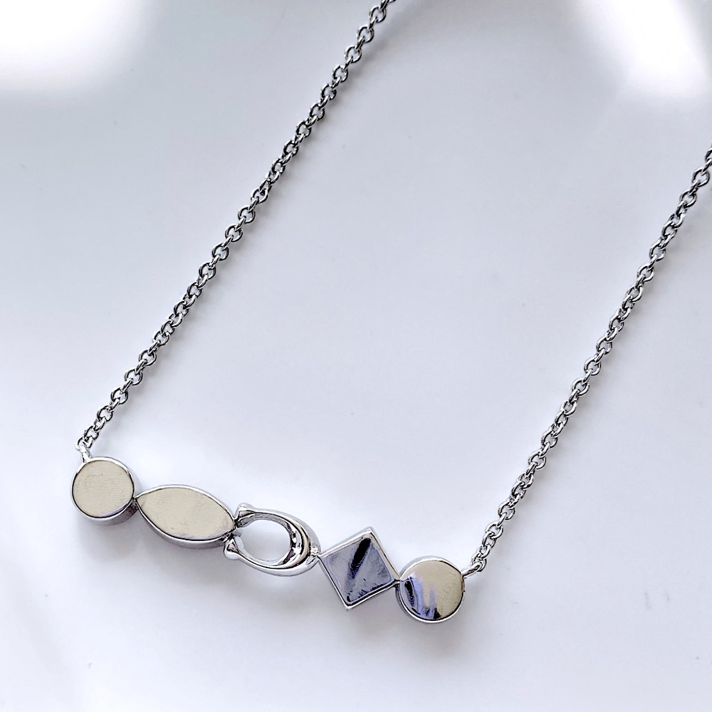 COACH Signature Silver Logo Bezel Earring and Necklace Set - Picture 7 of 14